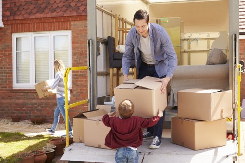 Removal van loading household furniture during a Barnet move
