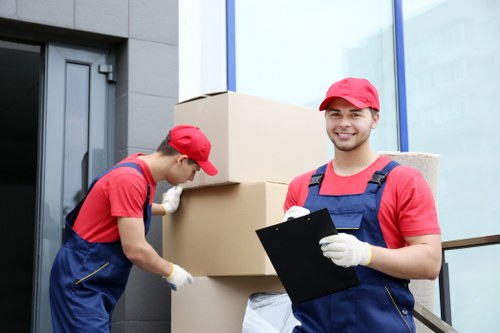 Removal team sorting recyclable household materials in Barnet
