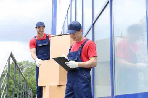 Professional piano removals in Barnet with careful lifting equipment