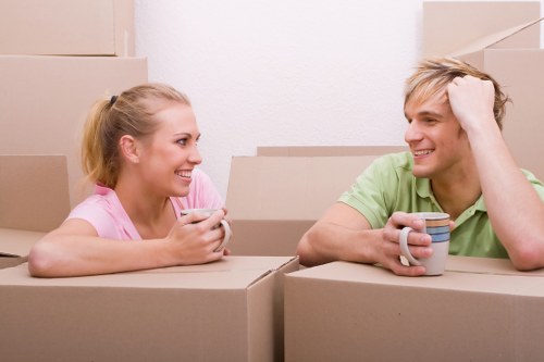 Student removals team handling boxes and furniture in Barnet