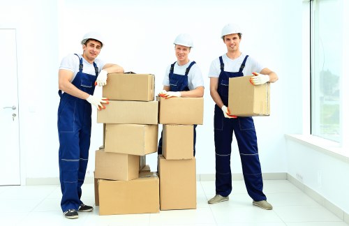 Moving team protecting furniture during a Barnet removal