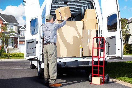 Professional removal team handling furniture during a same day move in Barnet